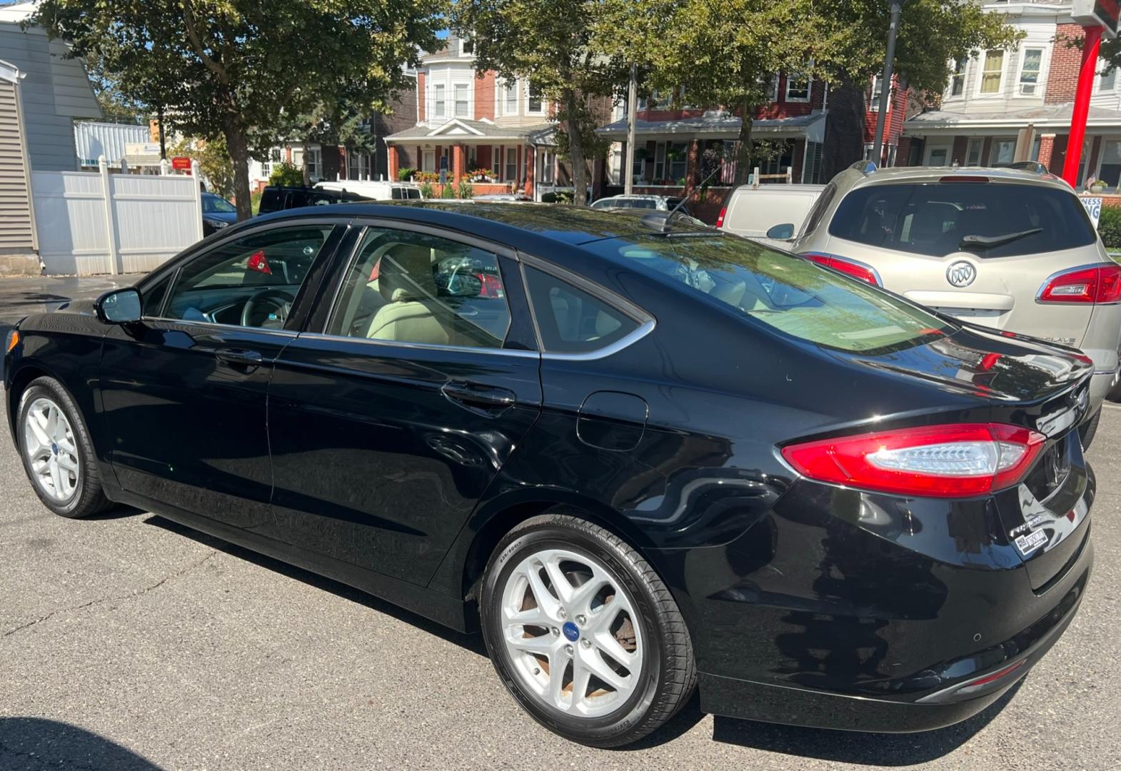 2016 BLACK /Beige Ford Fusion (3FA6P0H78GR) , located at 1018 Brunswick Ave, Trenton, NJ, 08638, (609) 989-0900, 40.240086, -74.748085 - Photo#1